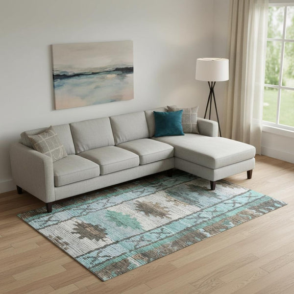 HomeRoots 10' Washable Brown Teal and Ivory Tribal Area Rug with UV Protection for Stylish Low-Maintenance Homes 709024