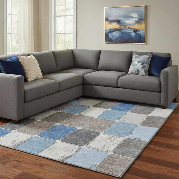 HomeRoots 9' X 12' Modern Geometric Area Rug in Blue, Ivory & Taupe - Stain Resistant with UV Protection! 709113