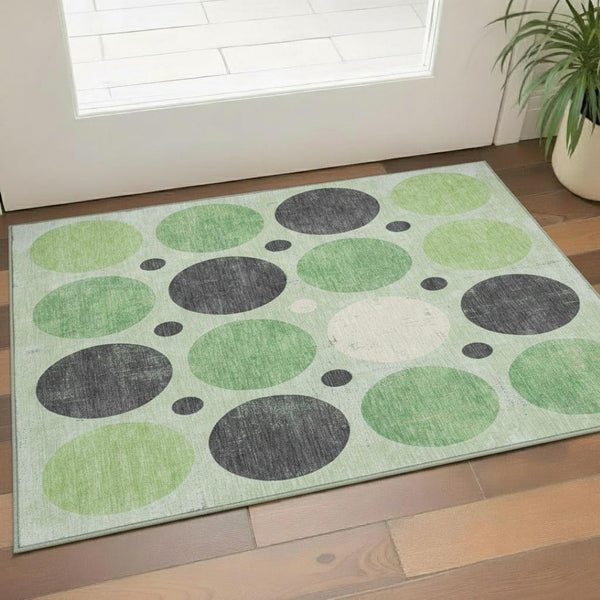 HomeRoots 5' X 8' Geometric Washable Area Rug in Green, Ivory & Charcoal – UV Protected, Non-Slip Design! 709152