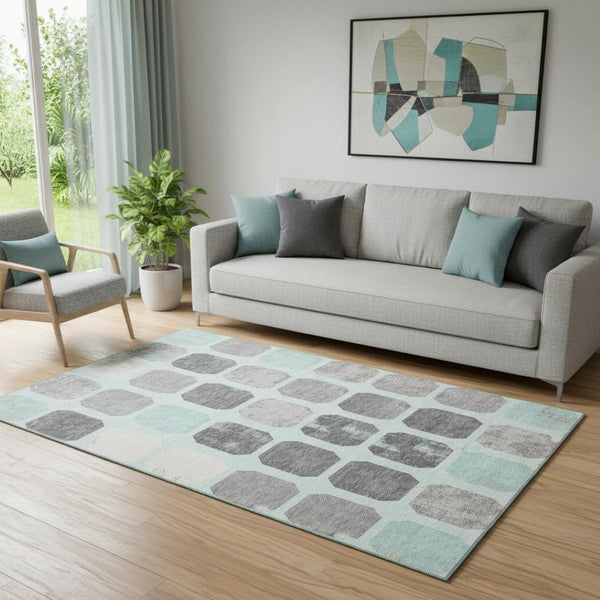HomeRoots 8' Teal Gray and Ivory Geometric Round Rug - Washable, UV-Protected, Perfect for High-Traffic Areas 709213