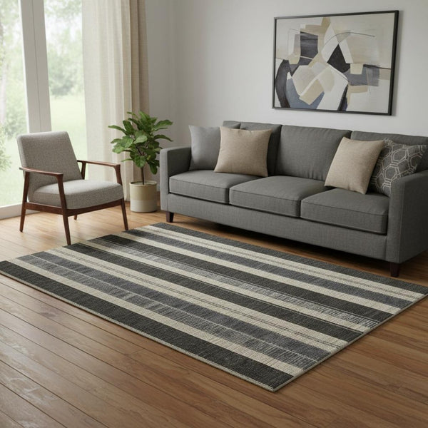 HomeRoots 8' Stylish Black, Ivory & Gray Striped Washable Round Rug with UV Protection for High-Traffic Areas 709261