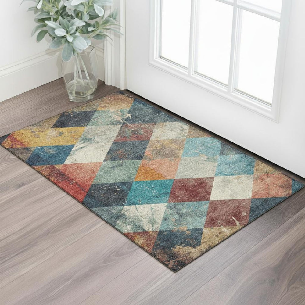 HomeRoots 5' X 8' Geometric Area Rug in Navy, Orange & Red - Washable, UV-Protected, Stain-Resistant Design 709308