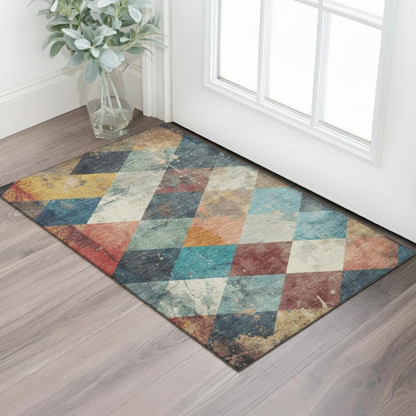 HomeRoots 5' X 8' Geometric Area Rug in Navy, Orange & Red - Washable, UV-Protected, Stain-Resistant Design 709308