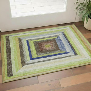 HomeRoots 5' X 8' Vibrant Geometric Area Rug in Lime Green, Blue & Brown - Washable, UV Protected, Durable Design 709338