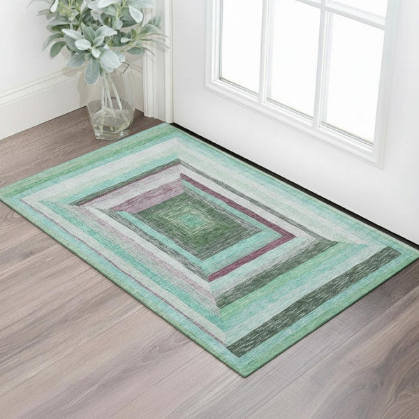 HomeRoots 5' X 8' Teal Mauve Ivory Geometric Washable Area Rug - Stylish, Durable, UV-Protected for Family Homes 709356