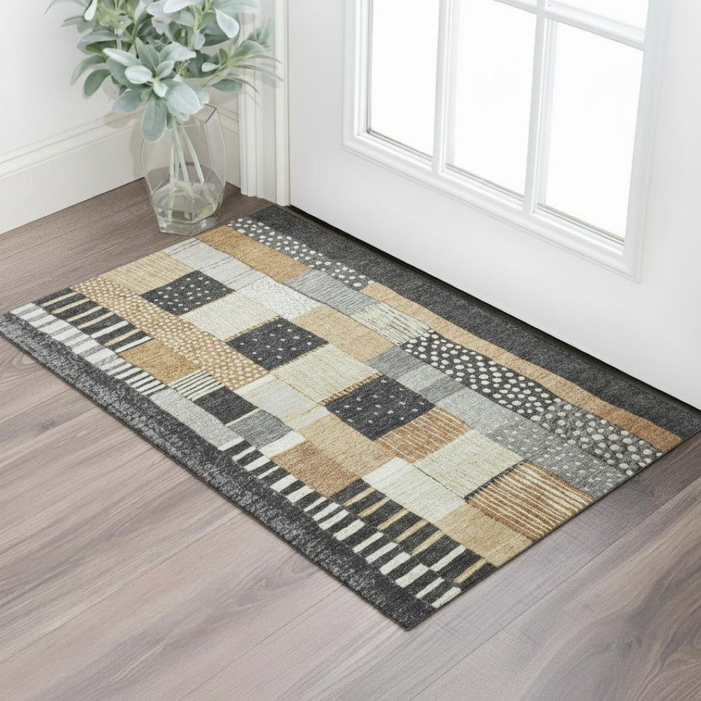 HomeRoots 5' X 8' Stylish Black and Gold Geometric Washable Area Rug with UV Protection for High Traffic Areas 709452