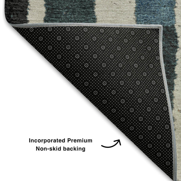 HomeRoots 9' X 12' Striped Washable Area Rug in Black, Blue & Copper - UV Protected, Durable & Stylish Design 709479