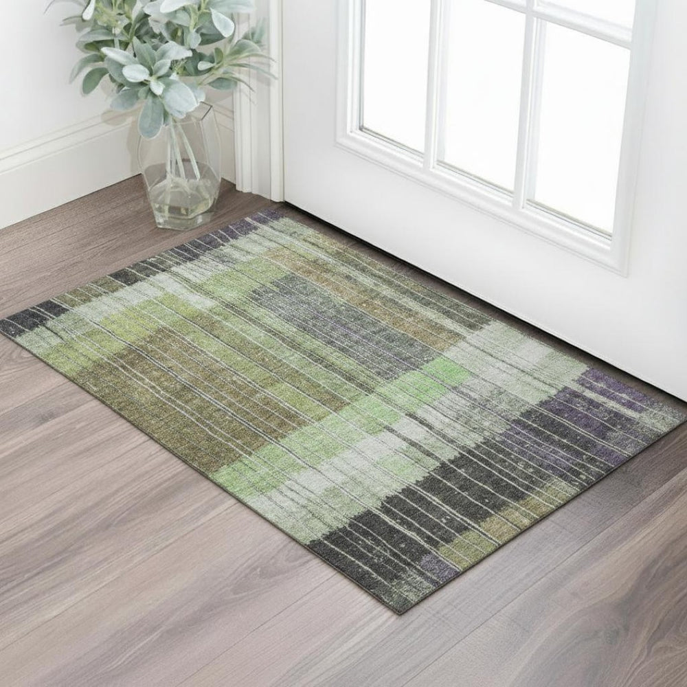 HomeRoots 5' X 8' Striped Washable Area Rug in Artichoke Green, Purple & Charcoal - UV Protected & Durable Design 709506