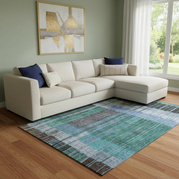 HomeRoots 9' X 12' Stylish Teal Ivory and Brown Striped Washable Area Rug with UV Protection for Homes 709527