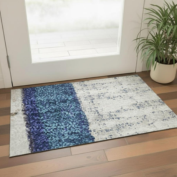 HomeRoots 5' X 8' Abstract Washable Area Rug in Artichoke Green, Blue & Ivory with UV Protection for Kids & Pets 709572