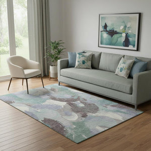 HomeRoots 8' Pale Aqua Brown Ivory Abstract Washable Round Rug - Durable, UV-Protected, Ideal for Family Spaces 709597