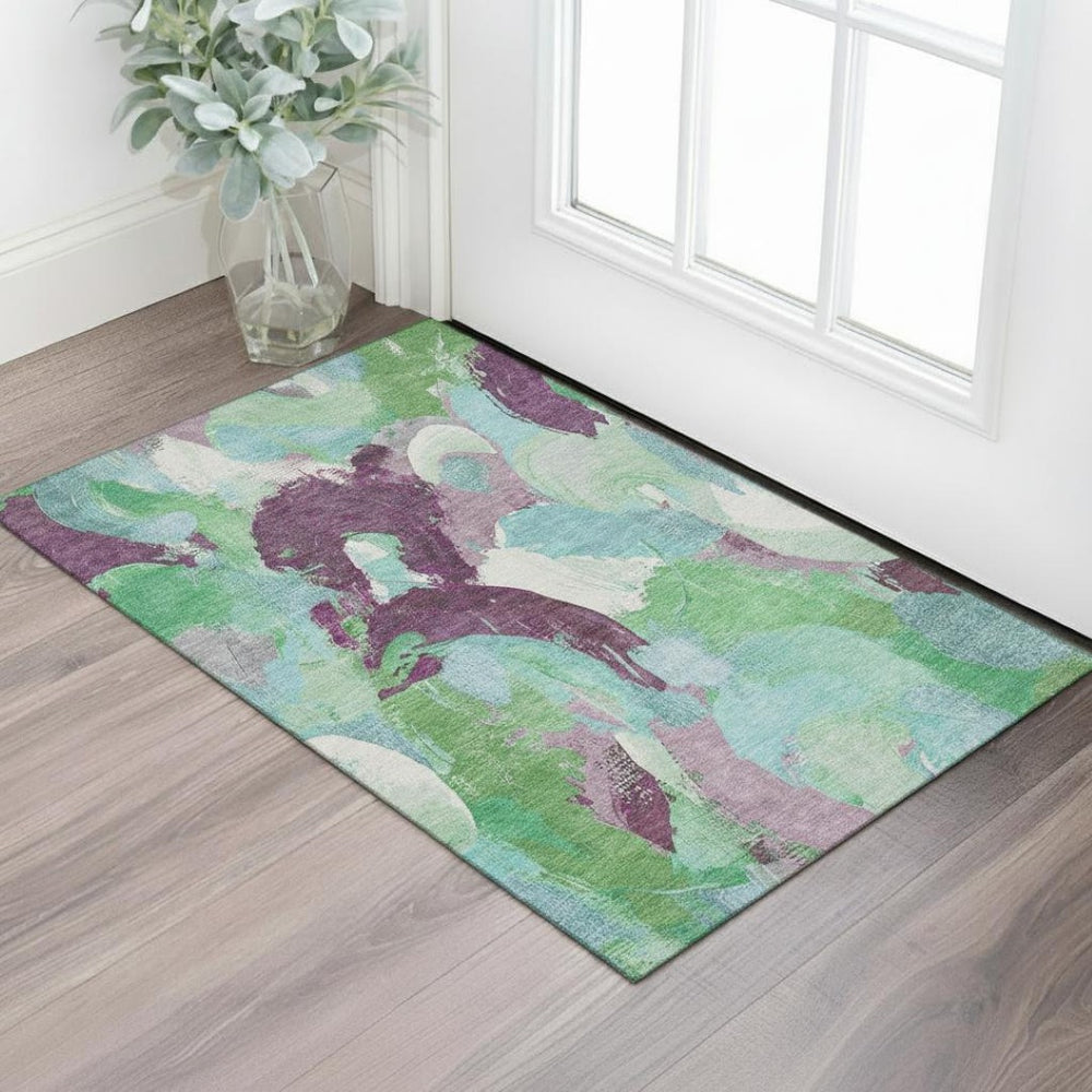 HomeRoots 5' X 8' Vibrant Teal Purple Green Abstract Washable Area Rug with UV Protection for Any Room 709602