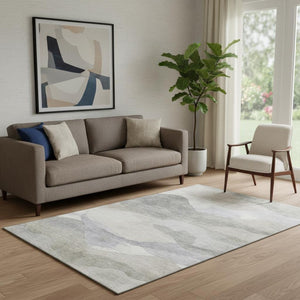 HomeRoots 8' Round Washable Abstract Rug in Beige, Gray & Ivory - UV Protected, Stain Resistant, Non-Slip Design 709609