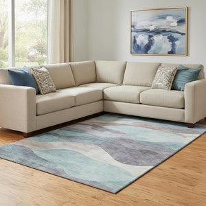 HomeRoots 9' X 12' Stylish Abstract Area Rug in Teal, Beige & Ivory - Washable, UV-Protected, Non-Slip Design 709641