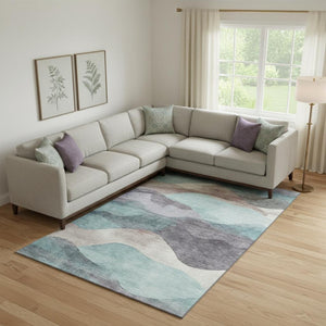 HomeRoots 10' X 14' Teal Beige Ivory Abstract Rug – Washable, UV-Protected & Stain-Resistant for High-Traffic Areas 709642