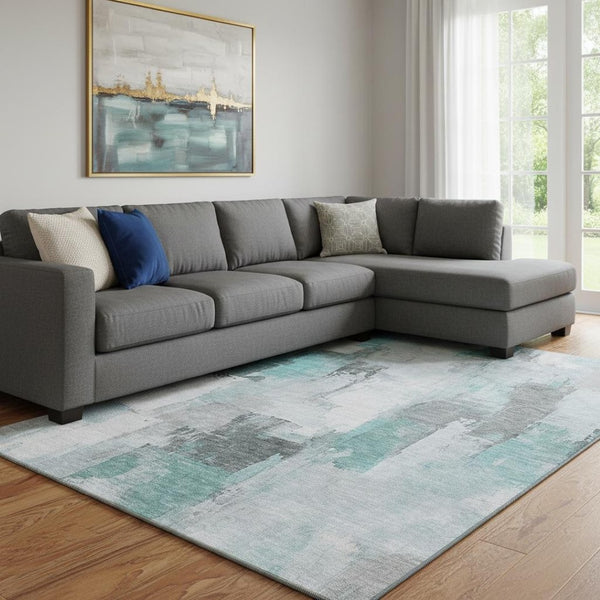 HomeRoots 9' X 12' Modern Abstract Teal Gray Ivory Washable Area Rug with UV Protection for Busy Homes 709683