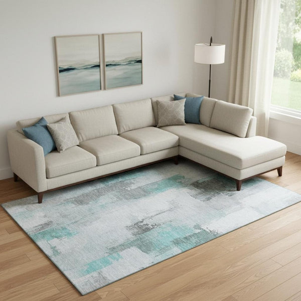 HomeRoots 10' X 14' Teal Gray Ivory Abstract Area Rug - Washable, UV-Protected, Stain-Resistant Design for Homes 709684