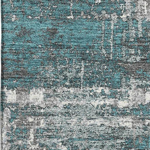 HomeRoots 8' Teal Gray and Ivory Geometric Round Rug – Washable, UV Protected, Perfect for Family Spaces! 709735