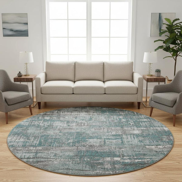 HomeRoots 8' X 10' Modern Geometric Teal Gray Ivory Washable Area Rug with UV Protection for Everyday Living 709736