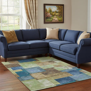 HomeRoots 9' X 12' Stylish Washable Area Rug in Blue Green Beige - UV Protected, Durable for High-Traffic Areas 709797