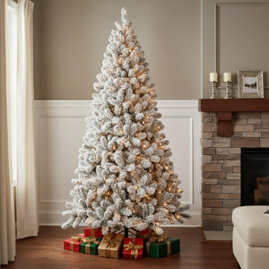 HomeRoots 7' Pre-Lit Flocked Spruce Christmas Tree - Lush, Snow-Dusted Foliage with 400 LED Lights for Effortless Holiday Cheer 709819