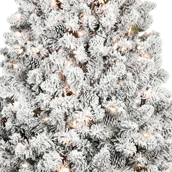 HomeRoots 4' Pre Lit Flocked Spruce Christmas Tree - Snowy Ambiance, Easy Setup, and Warm Lighting for Festive Joy 90 709835