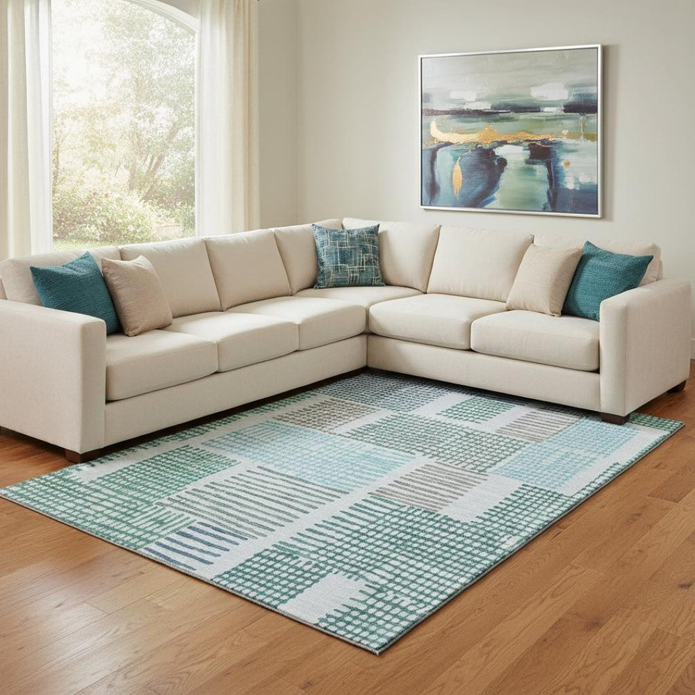 HomeRoots 9' X 12' Aqua Teal & Ivory Geometric Washable Area Rug - Durable, Stain-Resistant & UV Protected! 709847