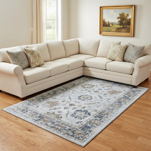 HomeRoots 9' X 12' Washable Blue Gray & Taupe Oriental Area Rug with UV Protection for Family-Friendly Spaces 709871