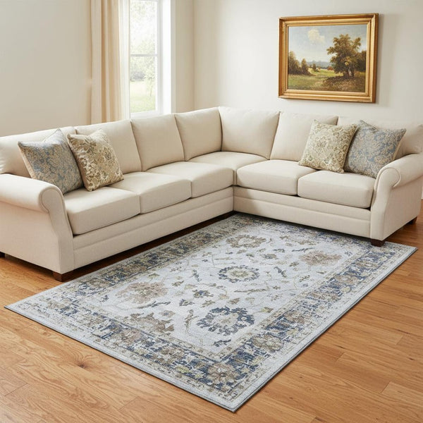HomeRoots 9' X 12' Washable Blue Gray & Taupe Oriental Area Rug with UV Protection for Family-Friendly Spaces 709871