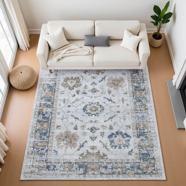 HomeRoots 9' X 12' Washable Blue Gray & Taupe Oriental Area Rug with UV Protection for Family-Friendly Spaces 709871