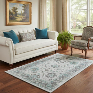 HomeRoots 8' Teal Gray and Charcoal Oriental Round Rug - Washable, UV Protected, Stain-Resistant, Non-Slip 709899