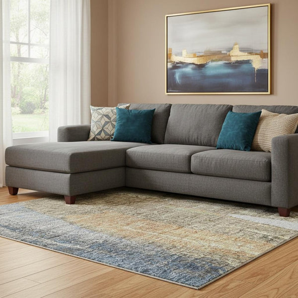 HomeRoots 9' X 12' Abstract Washable Area Rug in Navy Blue & Ivory - UV Protected, Stain Resistant & Durable Design 709961