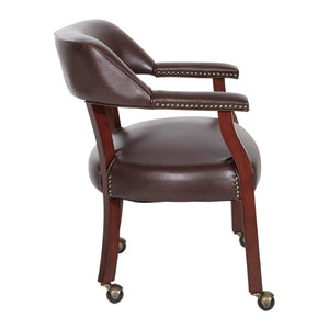 OSP Home Furnishings Traditional Guest Chair with Brass Nailhead Trim Vinyl Upholstery and Rolling Casters TV231-JT4