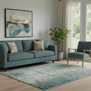 HomeRoots 8' Teal Charcoal and Ivory Abstract Round Rug - Washable, UV-Protected, Durable for High-Traffic Areas 710007