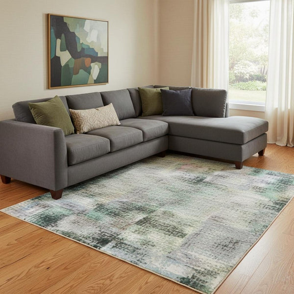 HomeRoots 9' X 12' Teal Charcoal Ivory Abstract Area Rug - Washable, UV Protected, Durable for High-Traffic Spaces 710009