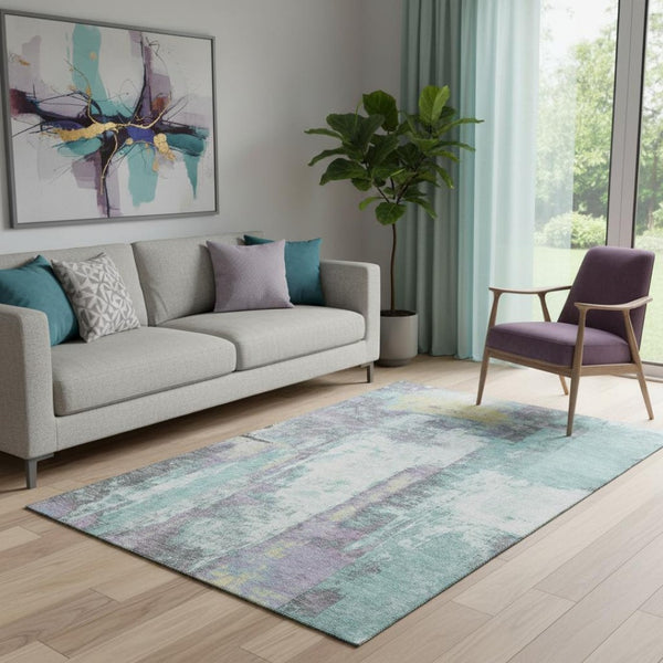 HomeRoots 8' Contemporary Teal Ivory & Purple Abstract Washable Round Rug with UV Protection for High Traffic 710115