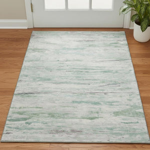 HomeRoots 5' X 8' Artichoke Green Abstract Area Rug – Washable, UV Protected, Durable & Stylish for Any Space! 710120
