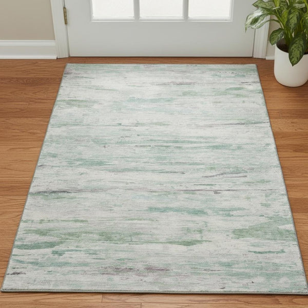 HomeRoots 5' X 8' Artichoke Green Abstract Area Rug – Washable, UV Protected, Durable & Stylish for Any Space! 710120
