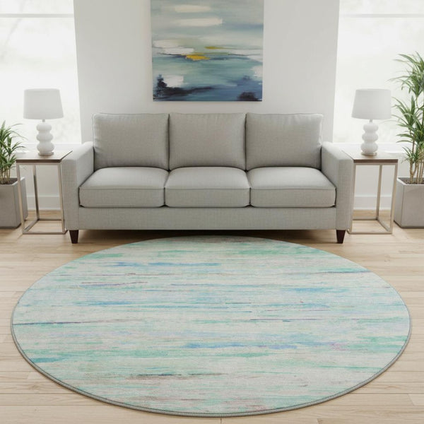 HomeRoots 8' X 10' Teal And Ivory Abstract Area Rug - Washable, UV-Protected, Stylish & Durable for Busy Homes 710152
