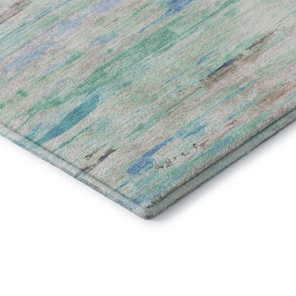 HomeRoots 9' X 12' Teal And Ivory Abstract Area Rug - Durable, Washable, UV-Protected, Ideal for Family Spaces 710153