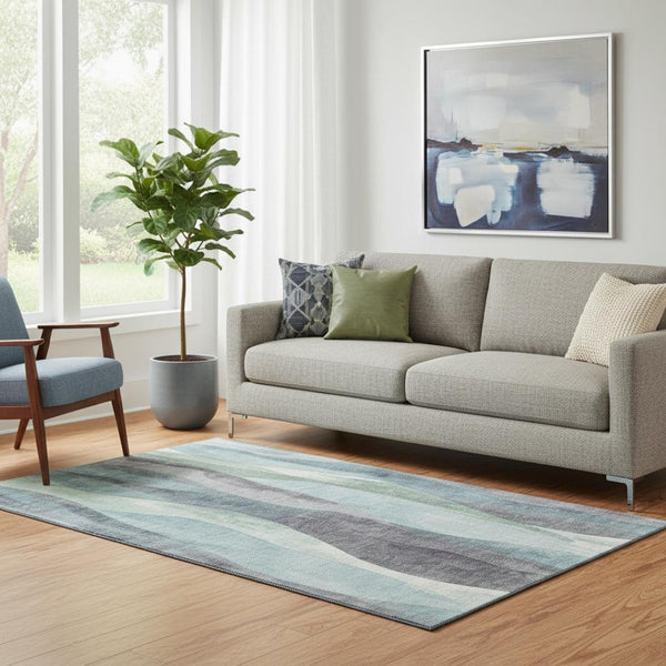 HomeRoots 8' Teal Plum and Ivory Abstract Washable Round Rug – Durable, UV-Protected, Stylish Floor Covering! 710283