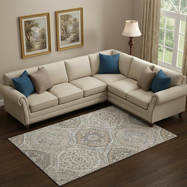 HomeRoots 10' X 14' Floral Area Rug in Beige, Ivory & Blue – Washable, UV-Protected, Durable for High-Traffic Areas 710292