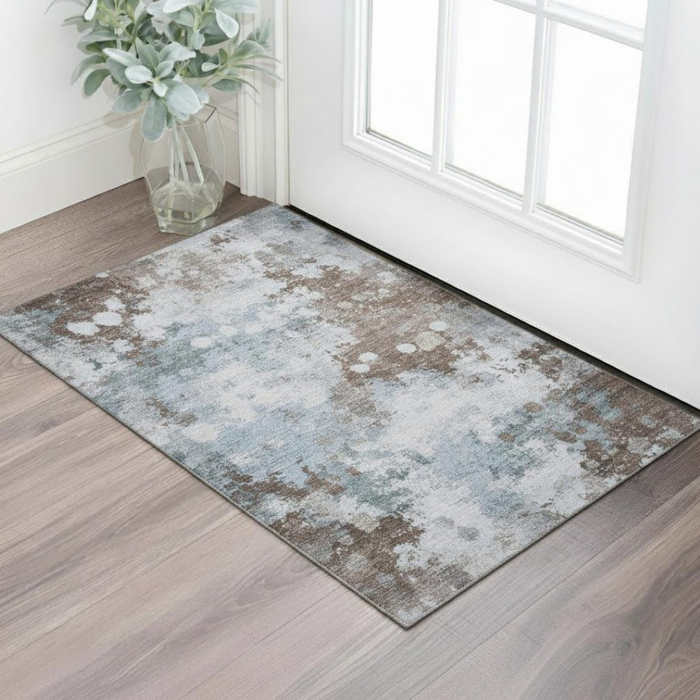 HomeRoots 5' X 8' Sky Blue & Brown Abstract Washable Area Rug with UV Protection for Modern Living Spaces 710348