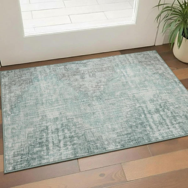 HomeRoots 5' X 8' Teal and Gray Geometric Area Rug – Washable, UV Protected, Stain Resistant for Modern Homes 710479