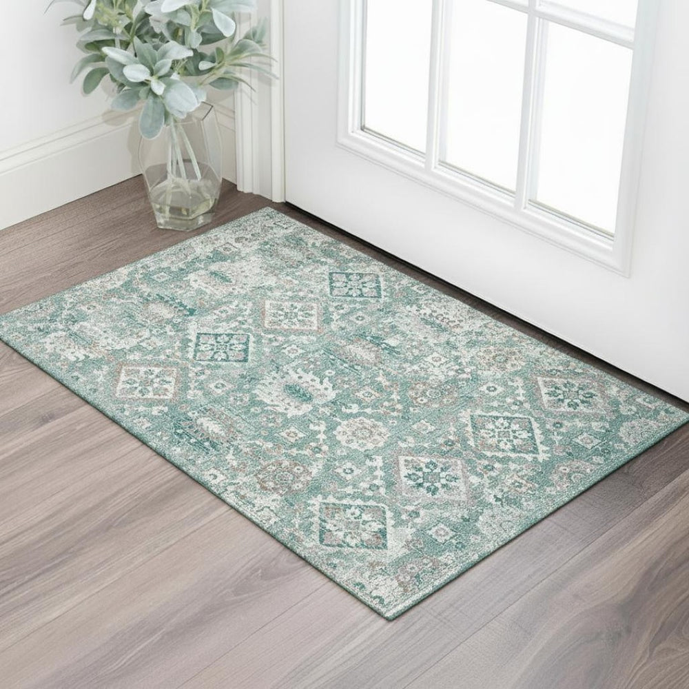HomeRoots 5' X 8' Pale Aqua & Ivory Oriental Washable Area Rug with UV Protection for Homes with Kids & Pets 710546
