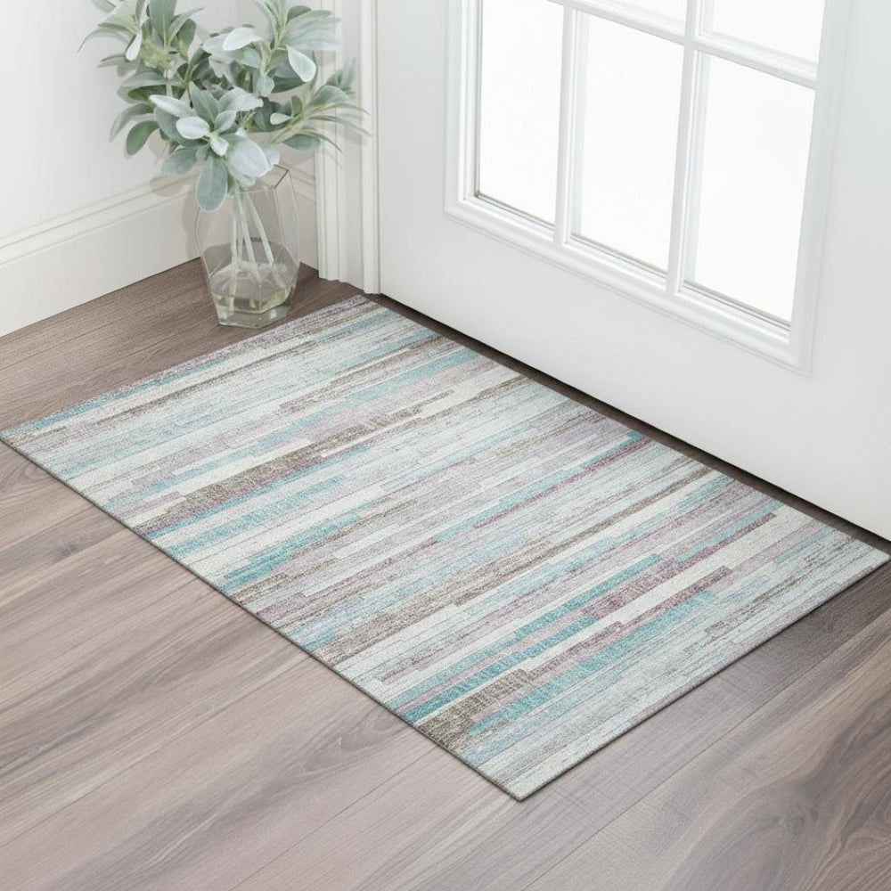 HomeRoots 5' X 8' Stylish Teal Beige Ivory Striped Washable Area Rug with UV Protection for High-Traffic Spaces 710600