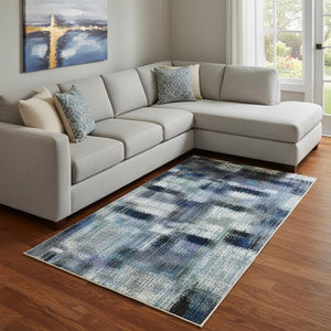 HomeRoots 9' X 12' Denim Blue Geometric Area Rug - Washable, Stain Resistant, UV Protected for Modern Homes 710609