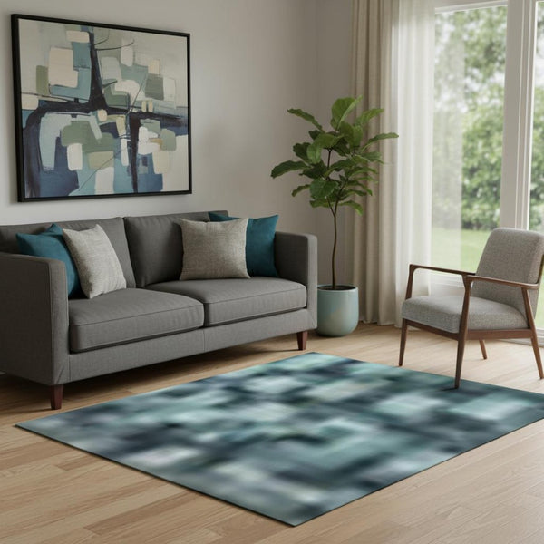 HomeRoots 8' Teal Ivory and Gray Geometric Round Rug - Washable, UV Protected, Ideal for Modern Spaces 710619