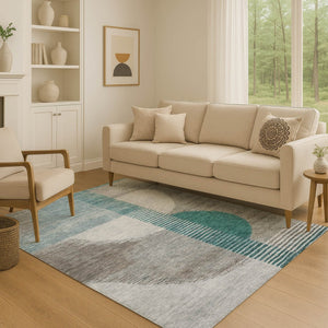 HomeRoots 8' Teal Ivory and Gray Geometric Round Rug - Washable, UV Protected, Ideal for Modern Spaces 710619