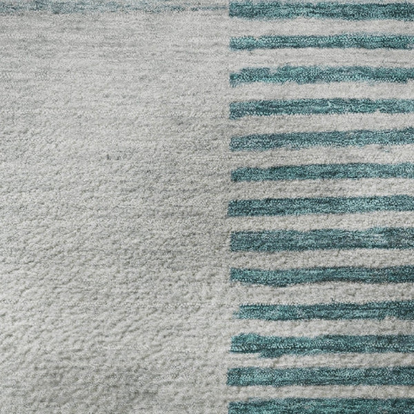 HomeRoots 8' Teal Ivory and Gray Geometric Round Rug - Washable, UV Protected, Ideal for Modern Spaces 710619